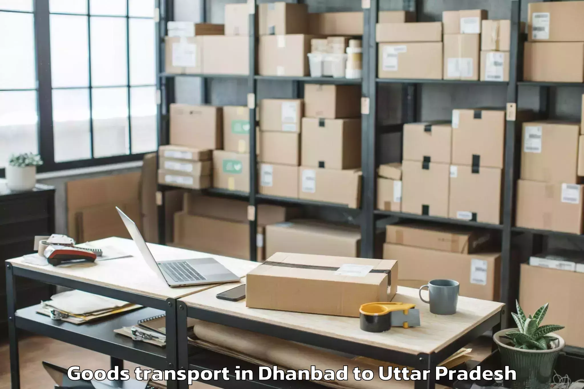 Book Your Dhanbad to Madhoganj Goods Transport Today